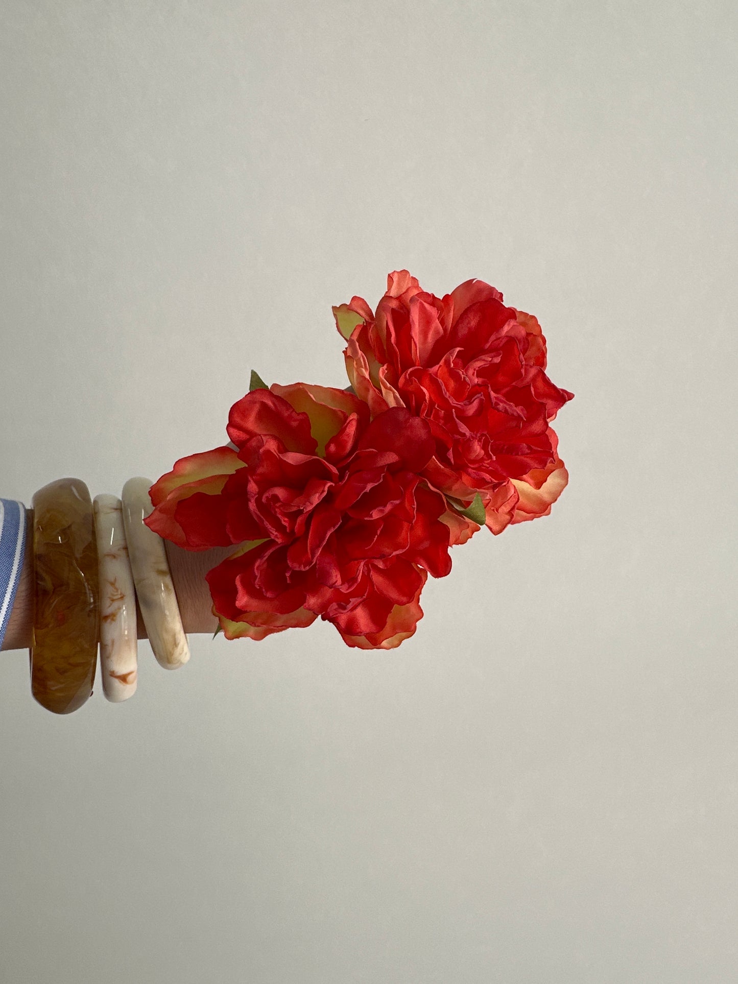 Flor rosa anaranjada/coral
