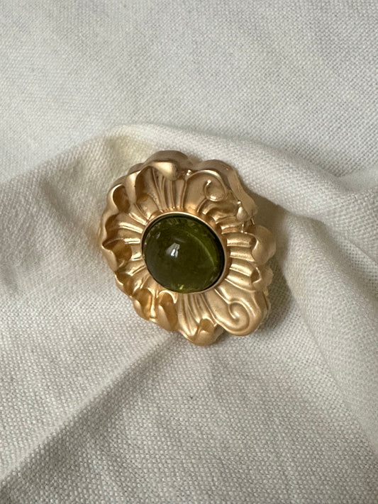 Broche flor verde