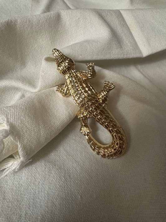 Broche cocodrilo