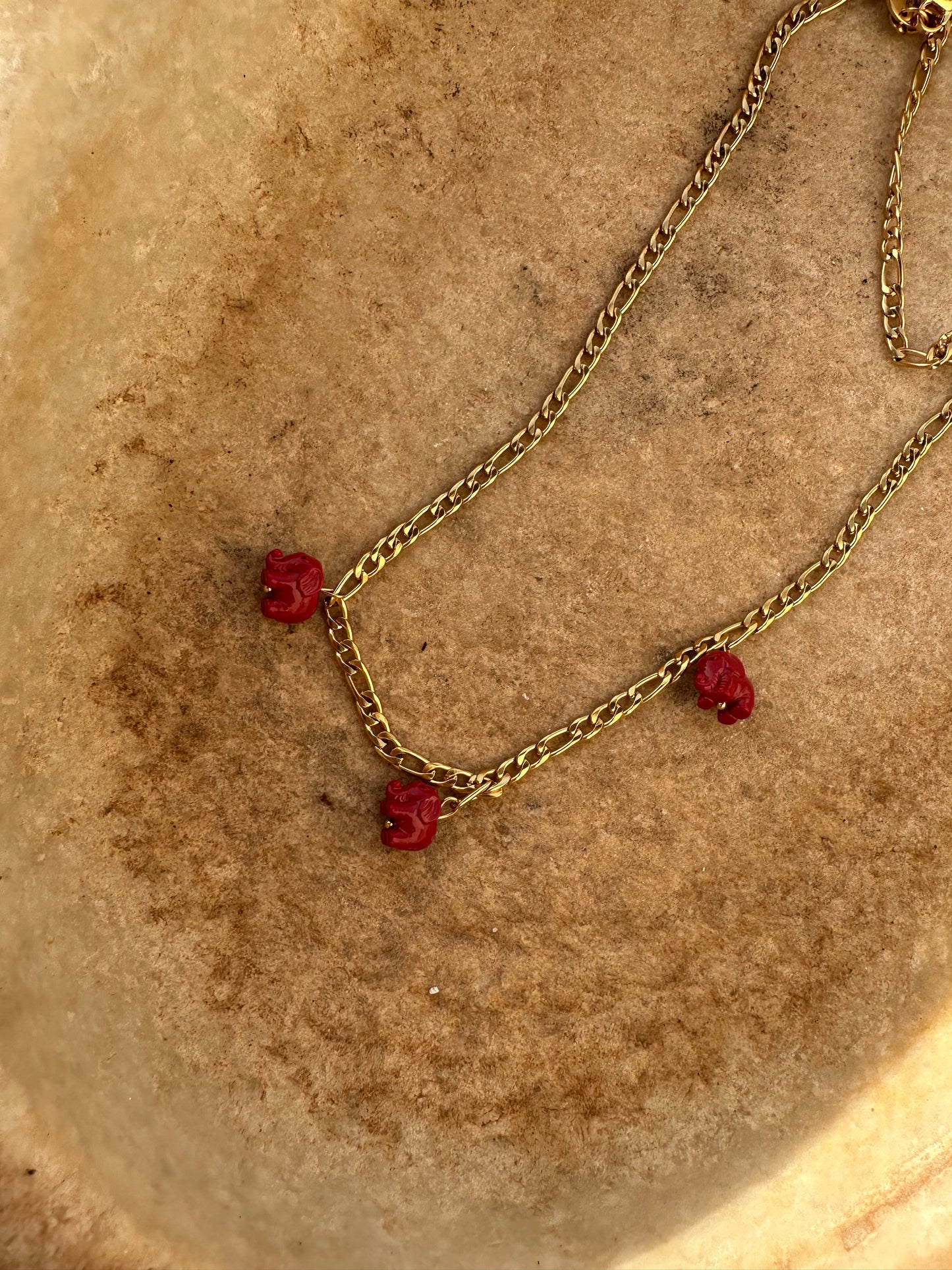 Drop collar cartier elefantes rojos