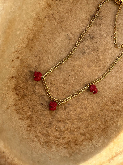 Drop collar cartier elefantes rojos