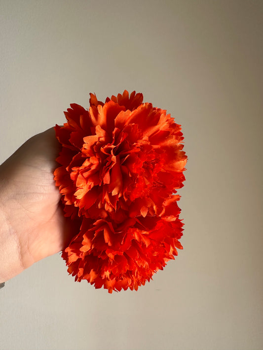 Flor clavel naranja