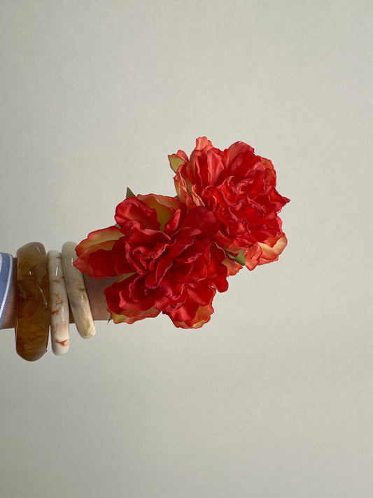 Flor rosa anaranjada/coral