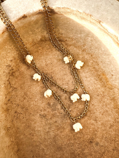 Drop collar cartier elefantes beige