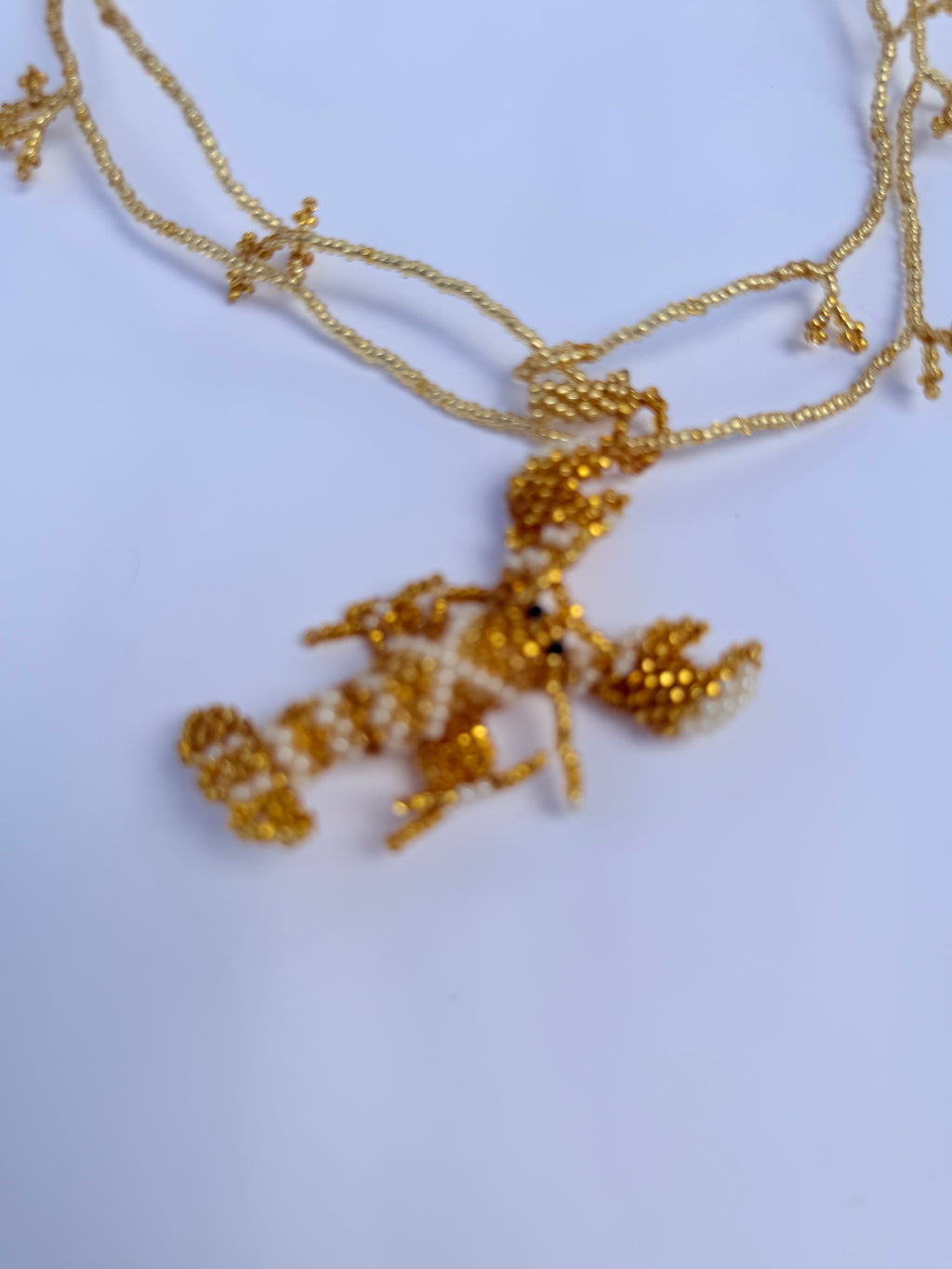 Collar bogavante dorado cuentas de cristal