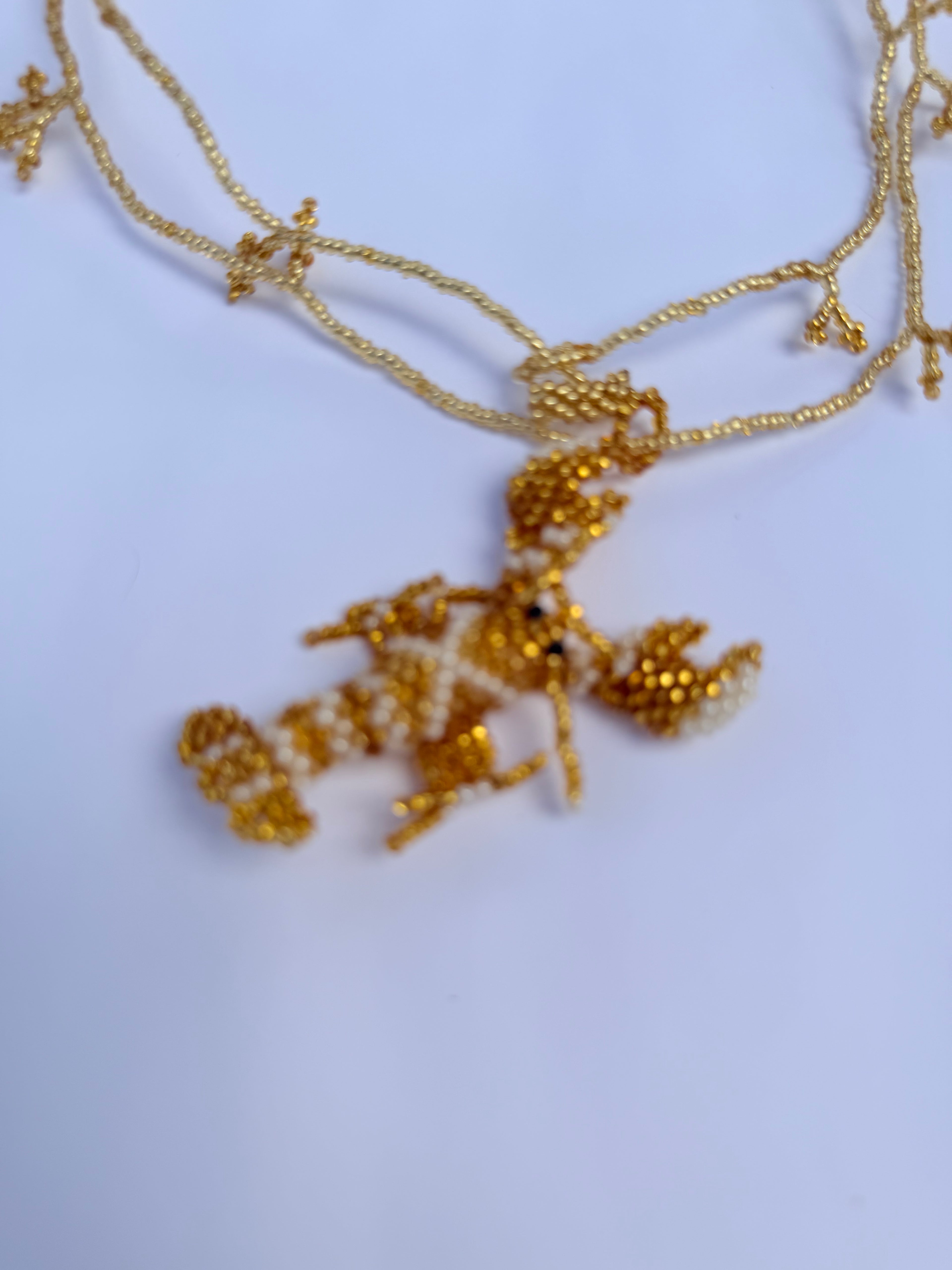 Collar bogavante dorado cuentas de cristal