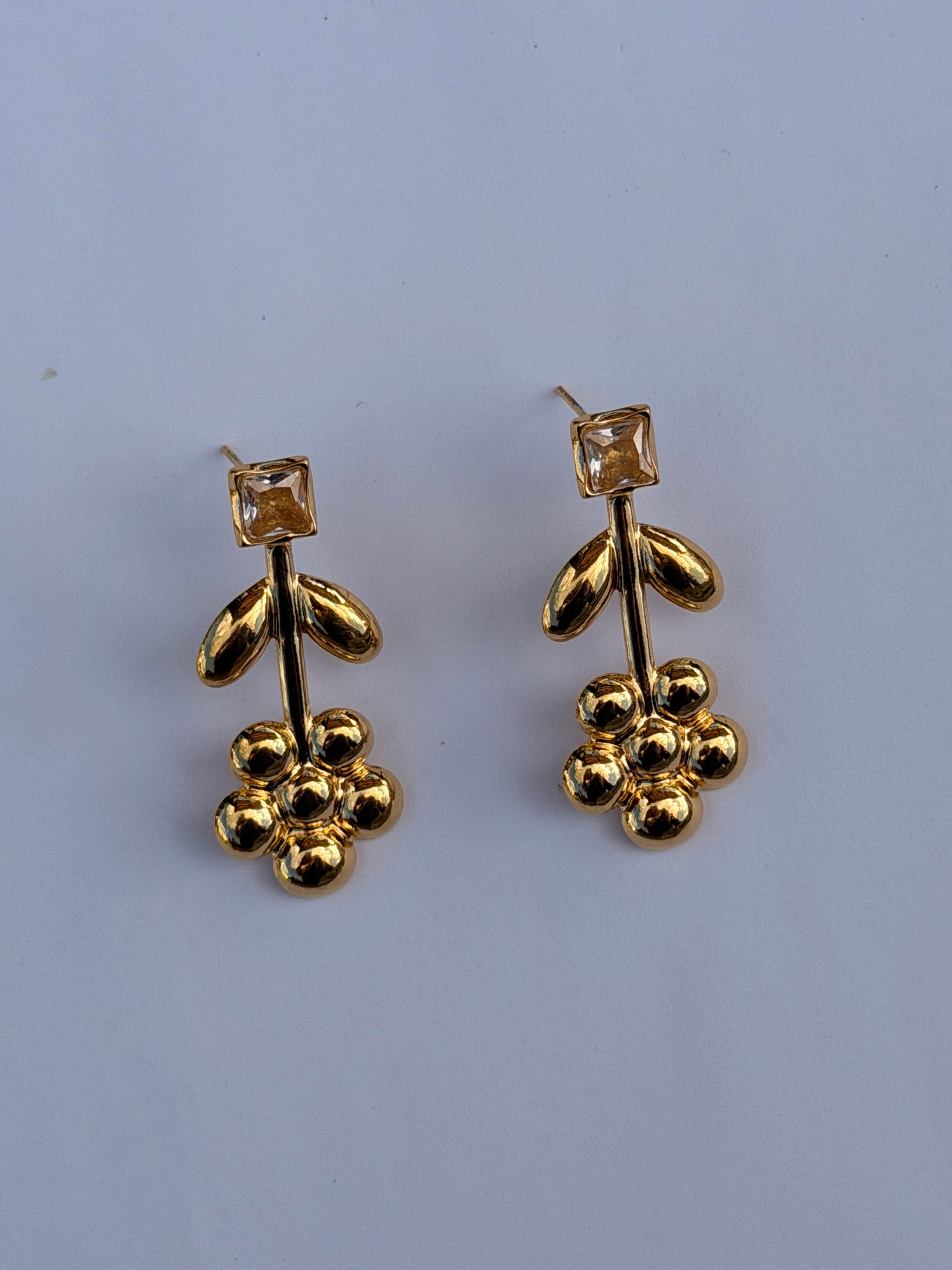 Pendientes florecilla brilli inox