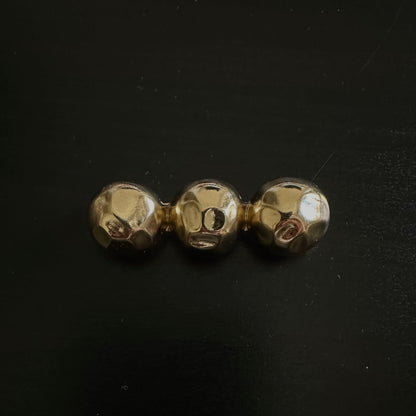 Broche puntos